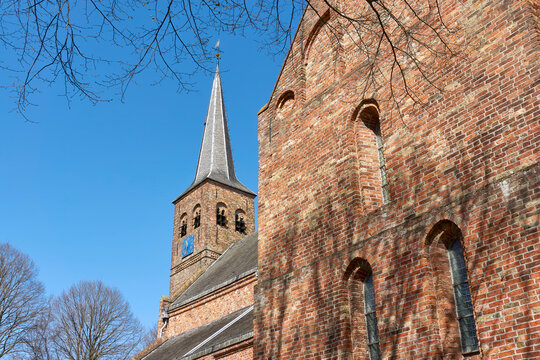View on the romano-gothic protestant church of Burgum, The Netherlands from the 13th century. Also known as Cross Church, Saint Martin's church or Kruiskerk.	