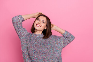 Photo of dreamy pretty lady dressed sweater looking empty space isolated pink color background