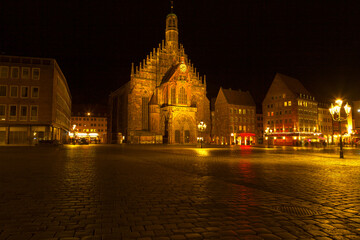 Nuremberg Hauptmarkt illuminated in the night . Frauenkirche Gothic Catholic Church in Nuremberg Bavaria 