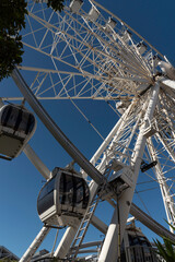 South Africa. 2022. Passenger observation cabin on a large big wheel attraction viewed looking upward.