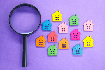 magnifying glass looking for a home. the concept of Property inspection or home search