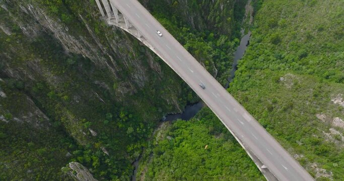 Aerial footage of cars driving over the Bloukrans Bridge, South Africa