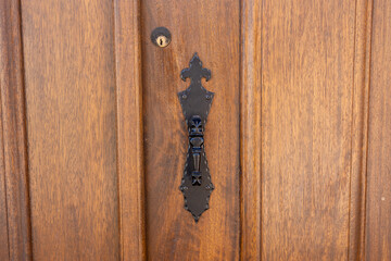 Old lock on wooden door