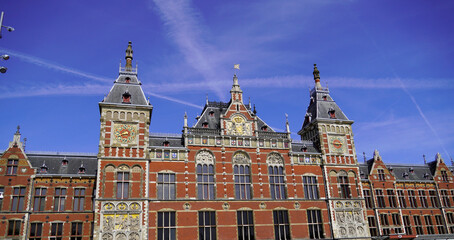 Fototapeta na wymiar Historical building of the train station in Amsterdam, Netherlands. 