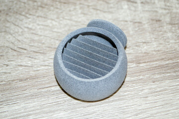 One model gray printed on 3D printer. Gray object printed on 3D printer made of plastic close-up. One isolated of 3D printed model. Prototype of various shapes made by 3d printer. Symbol innovative