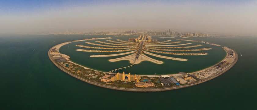 Panoramic aerial view of Palm Jebel Ali peninsula in Dubai, United Arab Emirates.