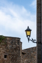 old lamppost in the medieval village of pals on the costa brava in northern spain