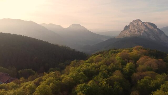 aerial footage of sunset over the mountains in Urkiola Natural Park, in the basque country, Spain