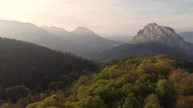aerial footage of sunset over the mountains in Urkiola Natural Park, in the basque country, Spain