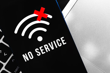 Modern smartphone with no service screen. Communication, cellular problem, bad connection concept photo
