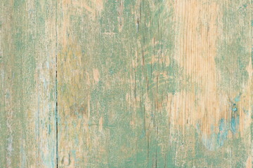 Texture of old painted wood. The old paint has peeled off the wood.