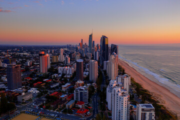 Aerial sunset views looking over Surfers Paradise streets and skyline