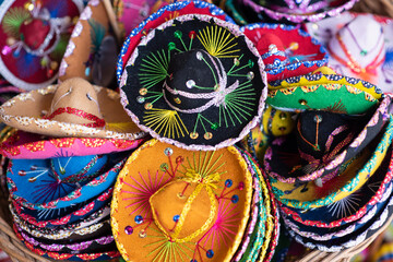 Close-up of small colorful sombreros for sale as souvenirs in Mexico