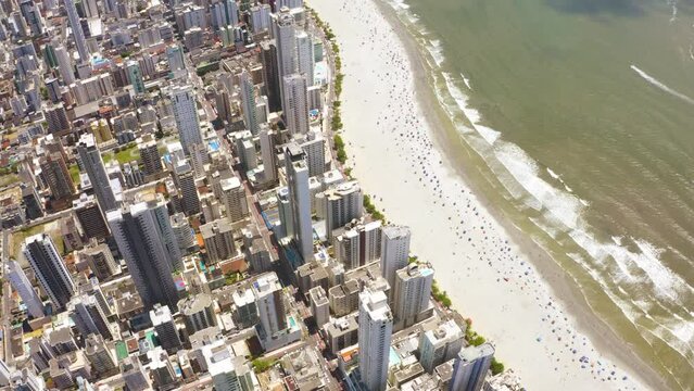 Aerial view of Balne&aacute;rio Cambori&uacute; coastal city during the summer, Brazil.