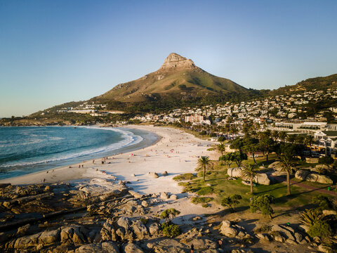 Aerial view of Camps Bay beach with Lion&rsquo;s Head Mountain in background, Cape Town, South Africa.