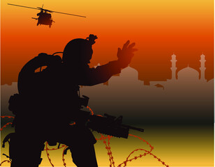 Fototapeta na wymiar the silhouette of a soldier waiting for rescue helicopter