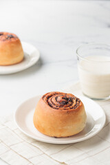 Round buns with poppy seeds