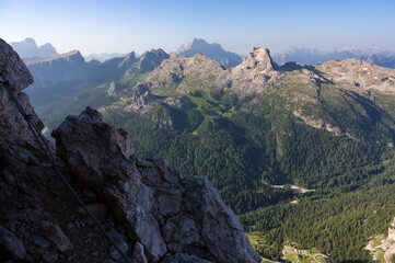 Lansdcape photo of the Dolomite region of Italy. The photo shows several mountain ranges in the Dolomite Alps. The image is taken from a considerable height.