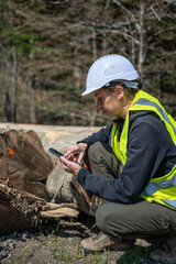 Pretty woman working as a forester.