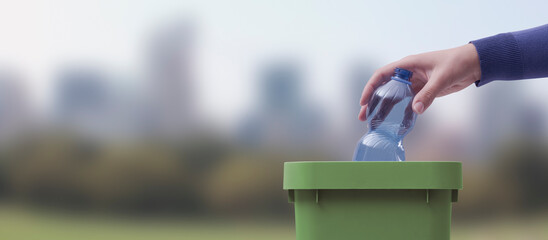 Woman putting a plastic bottle in a trash bin