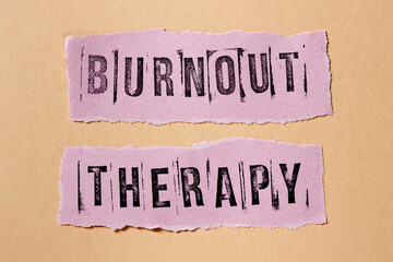 Burnout therapy text written on pink background. Psychological problems treatment concept.