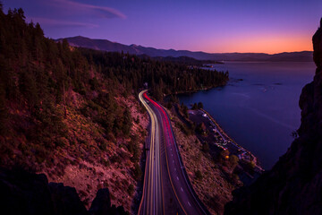 Highway near Lake Tahoe at sunset. The Long Exposure, Traffic, California, US