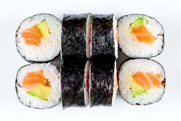 Fototapeta Top view of sushi nigiri, maki, sashimi rolls isolated on a white background obraz