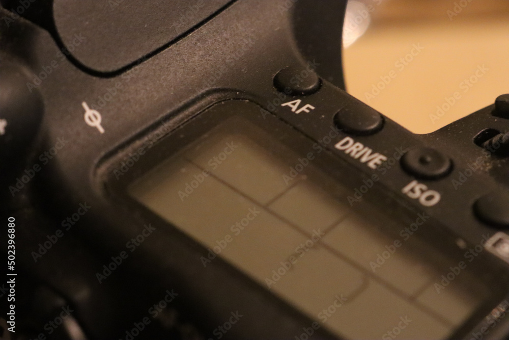 Poster closeup of a canon dslr lcd screen with buttons