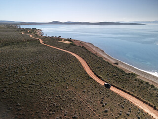 Aerial shot of a dirt road at the shore, Moonta, South Australia