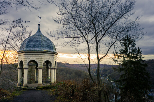 Stunning viewpoint Diederichstempel in Burg, Germany with a view to a scenic forest during sunset