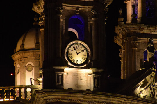 Photo of an old church bell tower in Pontevedra, Spain at night