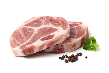 Steaks of raw marbled pork tenderloin with rosemary and peppercorns on a white background.
