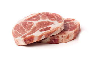 Steaks of raw marbled pork tenderloin on a white background.