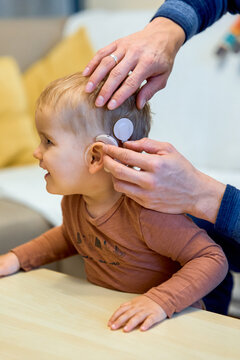 Shot of a deaf child with cochlear implants