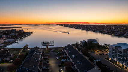 Aerial view of Wreck Lead Channel and a small village at sunrise in Long Island Park, NY