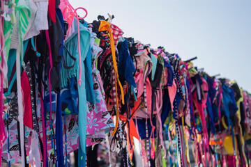 women's bikinis and swimsuits in a flea market
