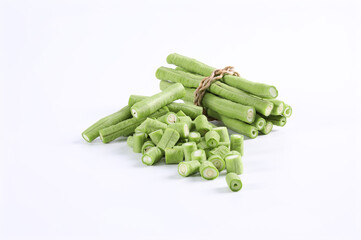 Long beans on a white background close-up photo of green vegetables. It's a kind of nut. It can be eaten raw as a side dish