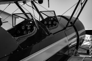 Grayscale image of a modern biplane with a beautiful modern design