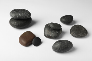 Fototapeta na wymiar Group of different stones on white background