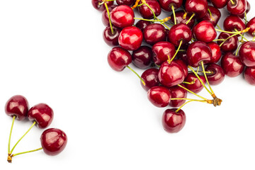 Obraz na płótnie Canvas Fresh cherry with stems isolated on white background.