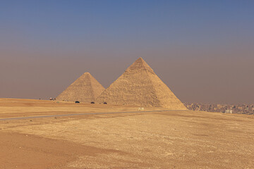 Fototapeta na wymiar Giza, Egypt - November 14, 2021: The great ancient Pyramids of Giza, Egypt