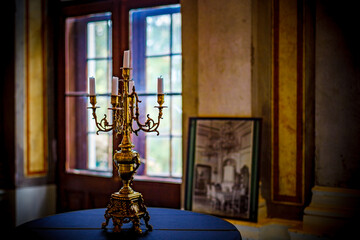 Selective focus shot of vintage golden candlestick