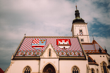 Low angle shot of St. Mark's Church in Zagreb, Croatia © Dimitar Chilov/Wirestock Creators