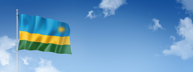 Rwanda flag isolated on a blue sky. Horizontal banner