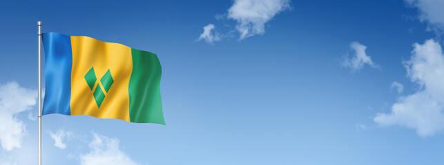 Saint Vincent and the Grenadines flag isolated on a blue sky. Horizontal banner