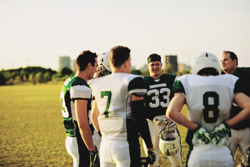Football team talking together during a practice