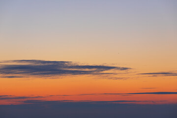 Sunrise in the sky with clouds.