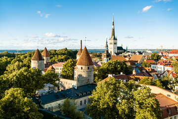 Tallinn, Estonia. Old town and city in summer. Baltic and nordic capital skyline in Europe. Historical castle and church. Downtown buildings aerial panorama view.