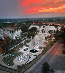 Aerial view of Wat Rong Khun, the white temple, at sunrise, in Chiang Rai, Thailand