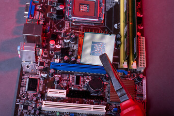 computer processor, microprocessor on the motherboard. red neon light